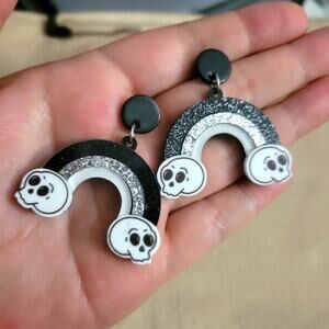 Cute cartoon skulls on gothic black glitter rainbow earrings